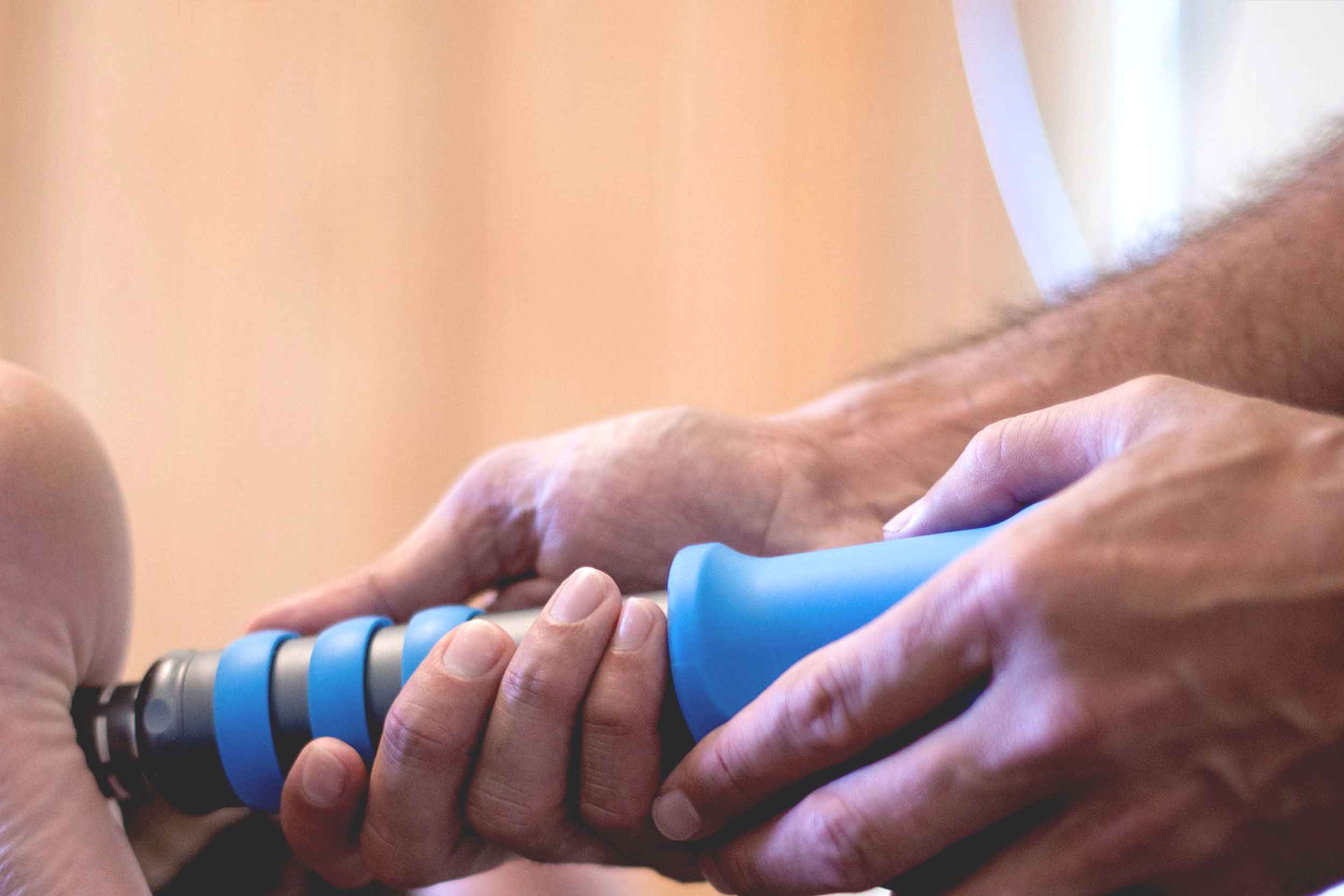 WHL clinician providing shockwave therapy